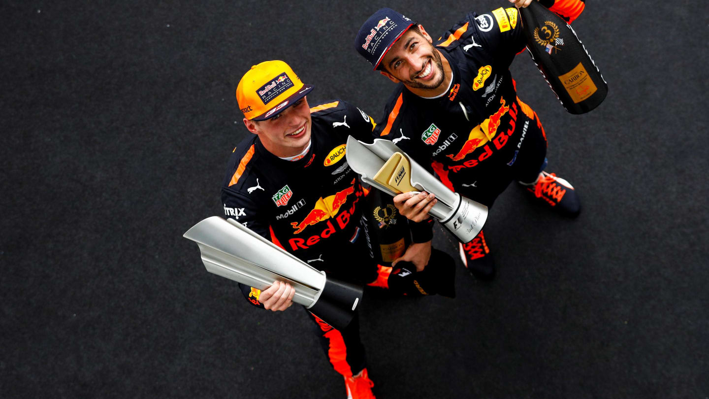 Race winner Max Verstappen (NED) Red Bull Racing and Daniel Ricciardo (AUS) Red Bull Racing celebrate on the podium with the trophies at Formula One World Championship, Rd15, Malaysian Grand Prix, Race, Sepang, Malaysia, Sunday 1 October 2017. © Mark Sutton/Sutton Images