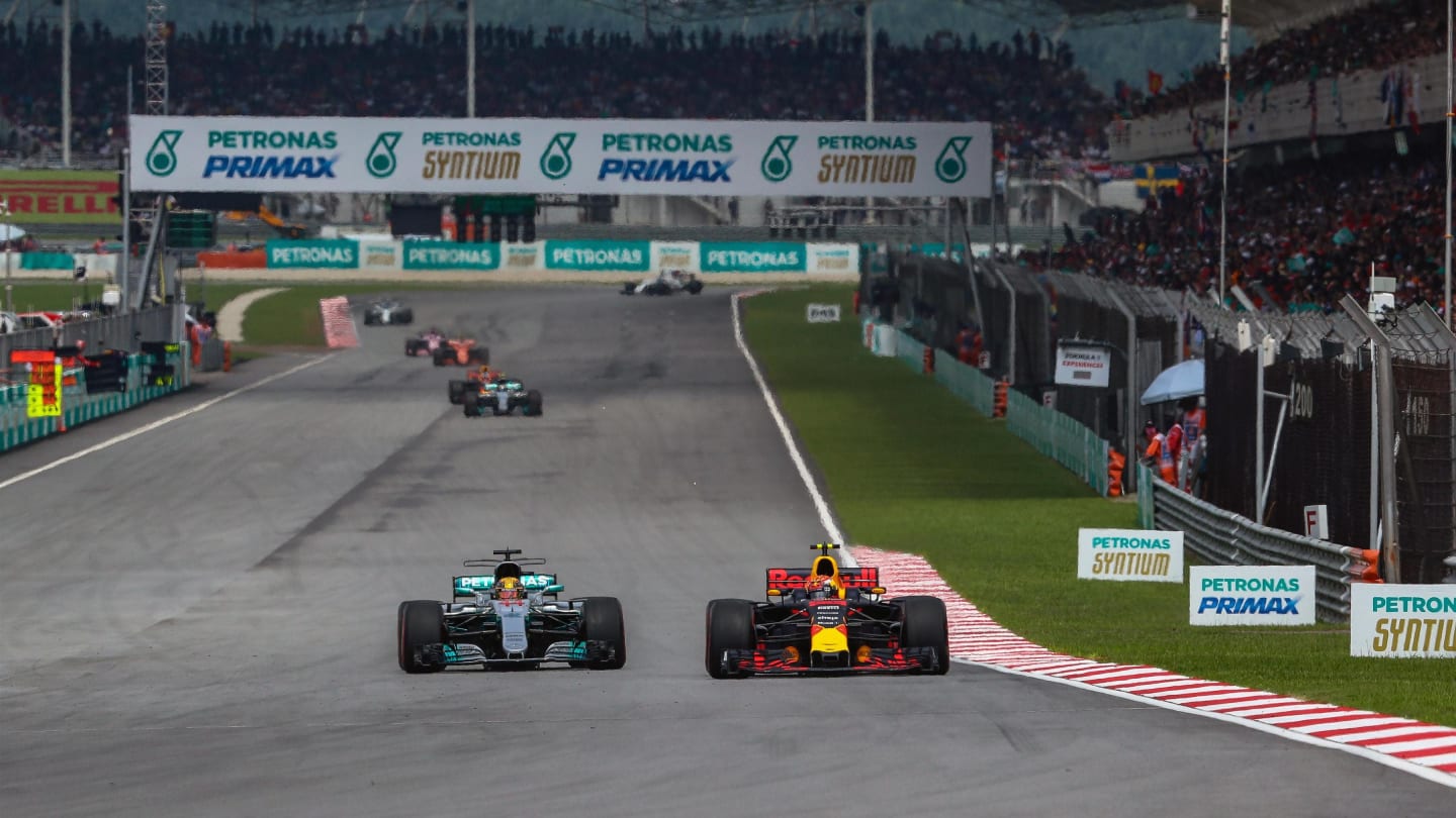 Lewis Hamilton (GBR) Mercedes-Benz F1 W08 Hybrid and Max Verstappen (NED) Red Bull Racing RB13