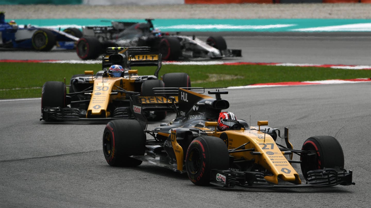 Nico Hulkenberg (GER) Renault Sport F1 Team RS17 leads Jolyon Palmer (GBR) Renault Sport F1 Team RS17 at Formula One World Championship, Rd15, Malaysian Grand Prix, Race, Sepang, Malaysia, Sunday 1 October 2017. © Mark Sutton/Sutton Images