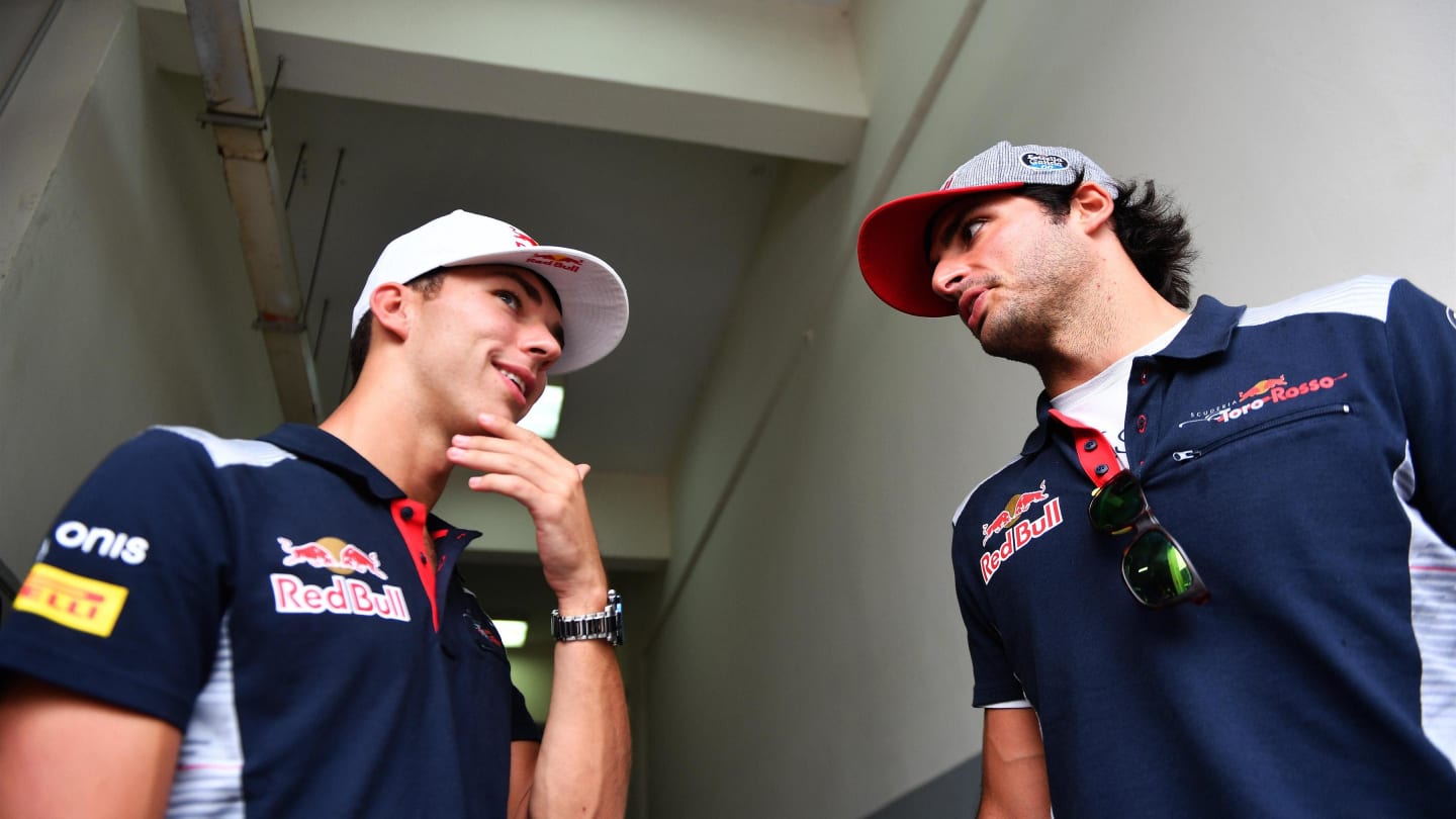Pierre Gasly (FRA) Scuderia Toro Rosso and Carlos Sainz jr (ESP) Scuderia Toro Rosso at Formula One World Championship, Rd15, Malaysian Grand Prix, Preparations, Sepang, Malaysia, Thursday 28 September 2017. © Mark Sutton/Sutton Images