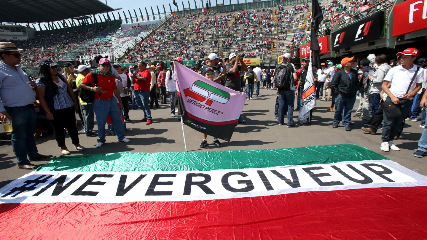 Fans with 'Never Give Up' Mexican banner and flag of Sergio Perez (MEX) Force India and at Formula One World Championship, Rd18, Mexican Grand Prix, Qualifying, Circuit Hermanos Rodriguez, Mexico City, Mexico, Saturday 28 October 2017. © Mirko Stange/Sutton Images