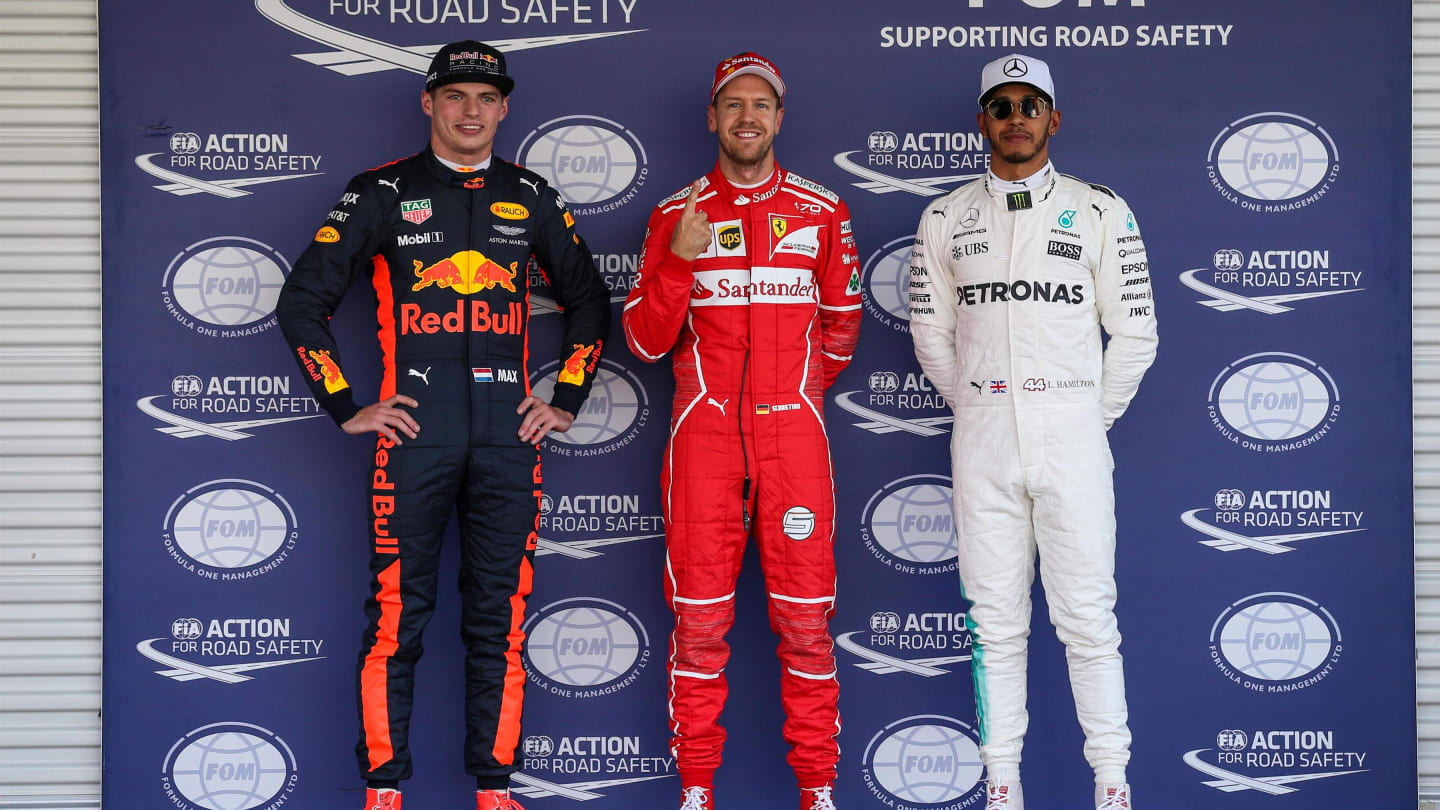 (L to R): Max Verstappen (NED) Red Bull Racing, pole sitter Sebastian Vettel (GER) Ferrari and Lewis Hamilton (GBR) Mercedes AMG F1 celebrate in parc ferme at Formula One World Championship, Rd18, Mexican Grand Prix, Qualifying, Circuit Hermanos Rodriguez