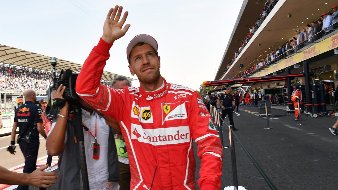 Pole sitter Sebastian Vettel (GER) Ferrari celebrates in parc ferme at Formula One World
