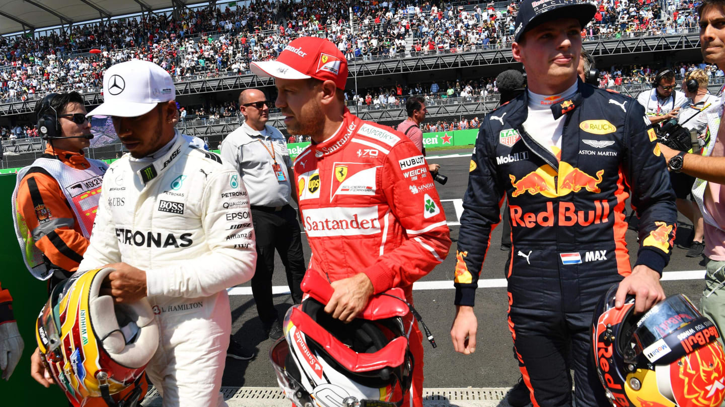 Lewis Hamilton (GBR) Mercedes AMG F1, pole sitter Sebastian Vettel (GER) Ferrari and Max Verstappen (NED) Red Bull Racing in parc ferme at Formula One World Championship, Rd18, Mexican Grand Prix, Qualifying, Circuit Hermanos Rodriguez, Mexico City, Mexic
