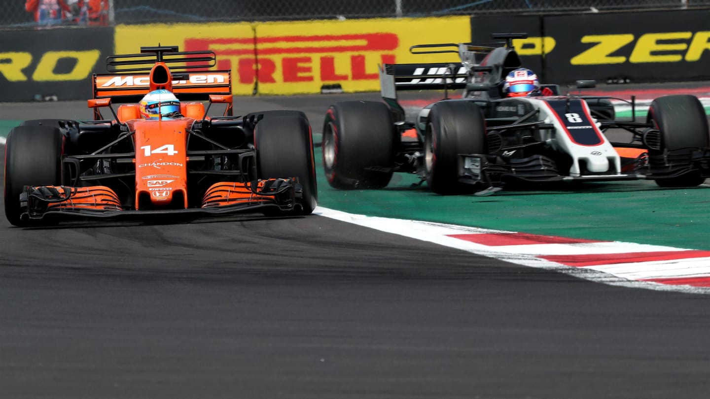 Fernando Alonso (ESP) McLaren MCL32 and Romain Grosjean (FRA) Haas VF-17 battle at Formula One World Championship, Rd18, Mexican Grand Prix, Race, Circuit Hermanos Rodriguez, Mexico City, Mexico, Sunday 29 October 2017. © Kym Illman/Sutton Images