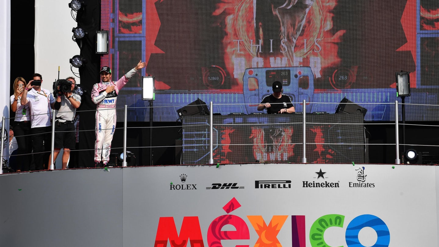 Sergio Perez (MEX) Force India on the podium post race at Formula One World Championship, Rd18,
