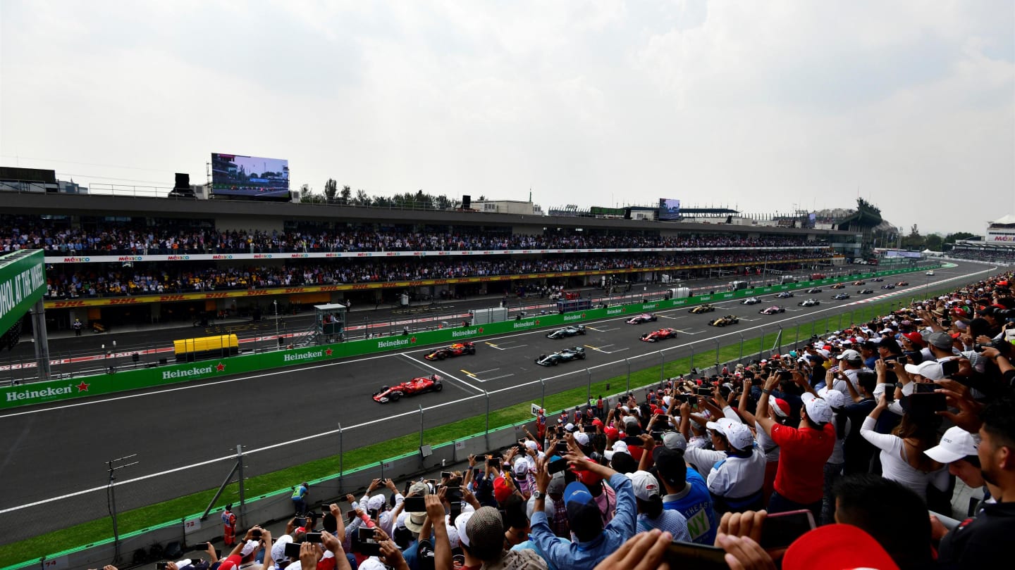 Sebastian Vettel (GER) Ferrari SF70-H leads at the start of the race at Formula One World