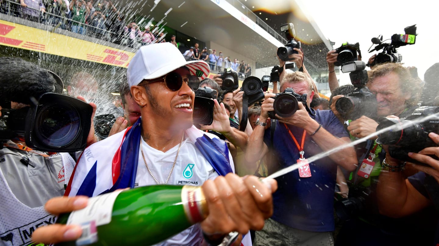 World Champion Hamilton (GBR) Mercedes AMG F1 celebrates with the team and the champagne at Formula One World Championship, Rd18, Mexican Grand Prix, Race, Circuit Hermanos Rodriguez, Mexico City, Mexico, Sunday 29 October 2017. © Mark Sutton/Sutton Images