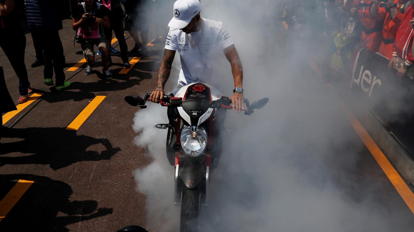 Lewis Hamilton (GBR) Mercedes AMG F1 does a burn out on his MV Agusta Custom Dragster RR LH44 Superbikeat Formula One World Championship, Rd6, Monaco Grand Prix, Monte-Carlo, Monaco, Friday 26 May 2017. © Sutton Images