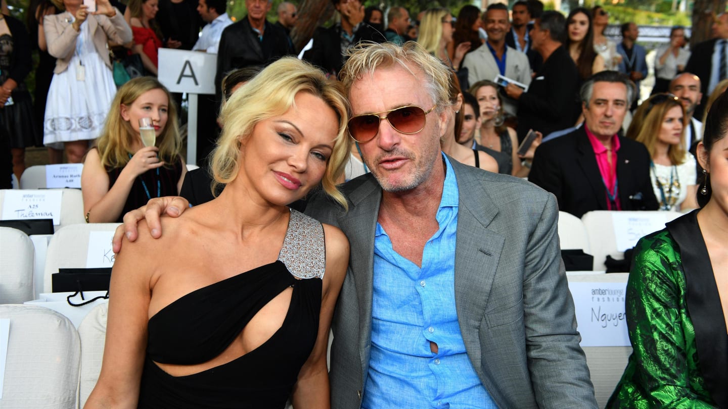 Pamela Anderson (USA) and Eddie Irvine (IRL) at the Amber Lounge Fashion Show, Le Meridien Beach Plaza Hotel, Monaco, Friday 26 May 2017. © Sutton Images