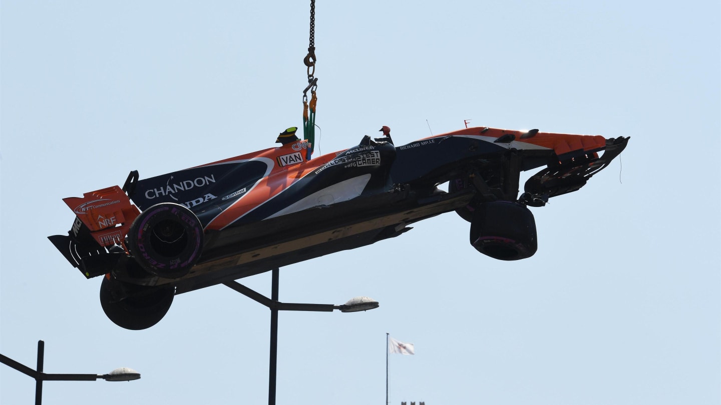 The crashed car of Stoffel Vandoorne (BEL) McLaren MCL32 is craned away in Q2 at Formula One World Championship, Rd6, Monaco Grand Prix, Qualifying, Monte-Carlo, Monaco, Saturday 27 May 2017. © Sutton Images