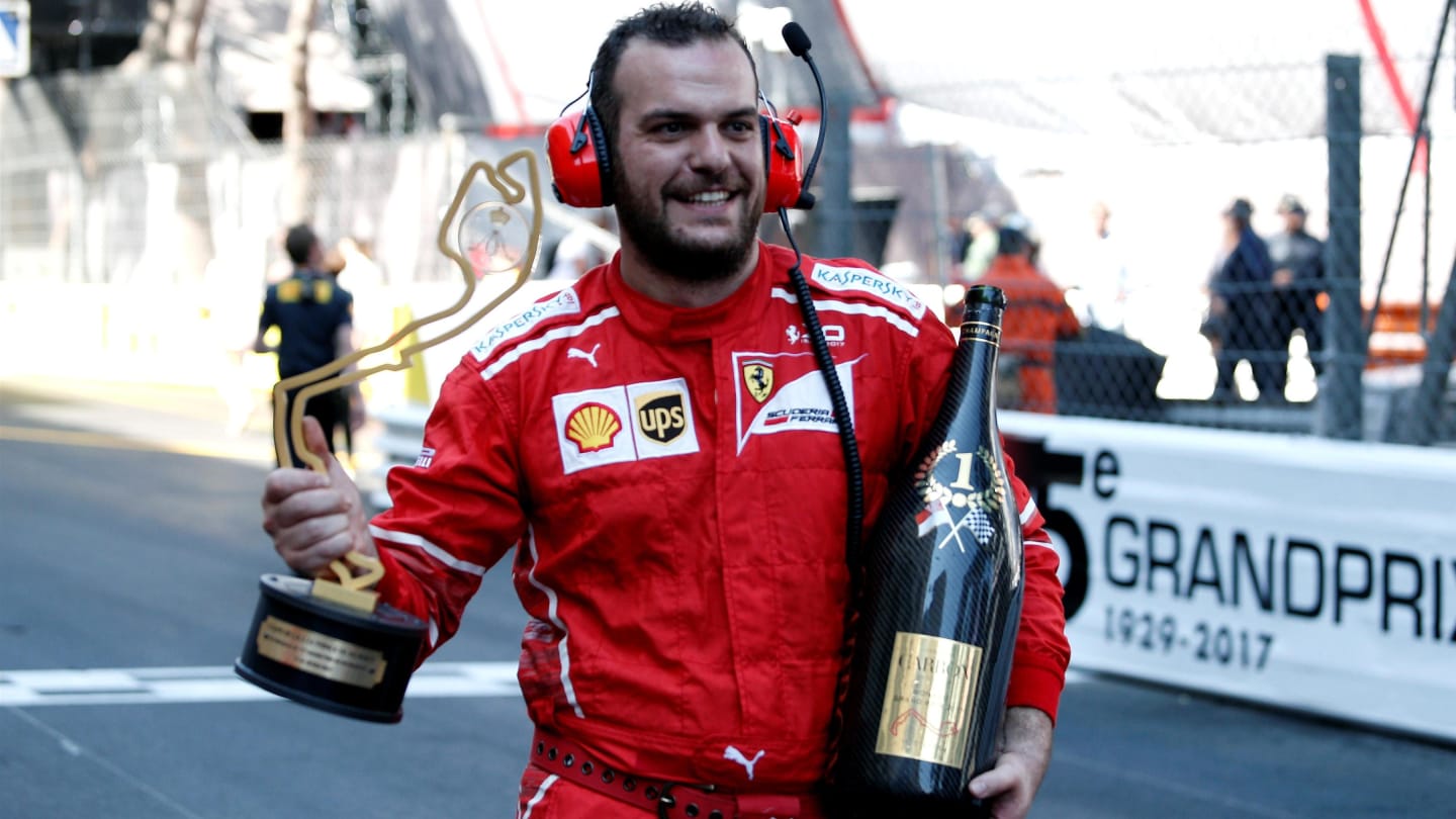 Ferrari mechanic celebrates with the trophy and the champagne in parc ferme at Formula One World Championship, Rd6, Monaco Grand Prix, Race, Monte-Carlo, Monaco, Sunday 28 May 2017. © Sutton Images
