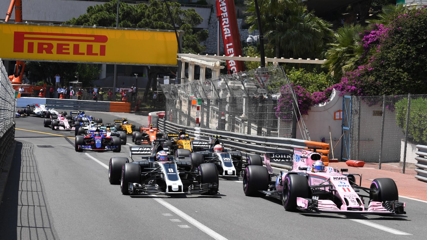 Sergio Perez (MEX) Force India VJM10 and Romain Grosjean (FRA) Haas VF-17 at the start of the race at Formula One World Championship, Rd6, Monaco Grand Prix, Race, Monte-Carlo, Monaco, Sunday 28 May 2017. © Sutton Images