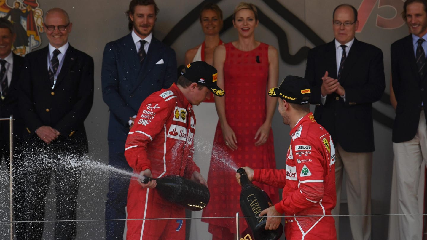 Race winner Sebastian Vettel (GER) Ferrari and Kimi Raikkonen (FIN) Ferrari celebrate on the podium with the champagne at Formula One World Championship, Rd6, Monaco Grand Prix, Race, Monte-Carlo, Monaco, Sunday 28 May 2017. © Sutton Images