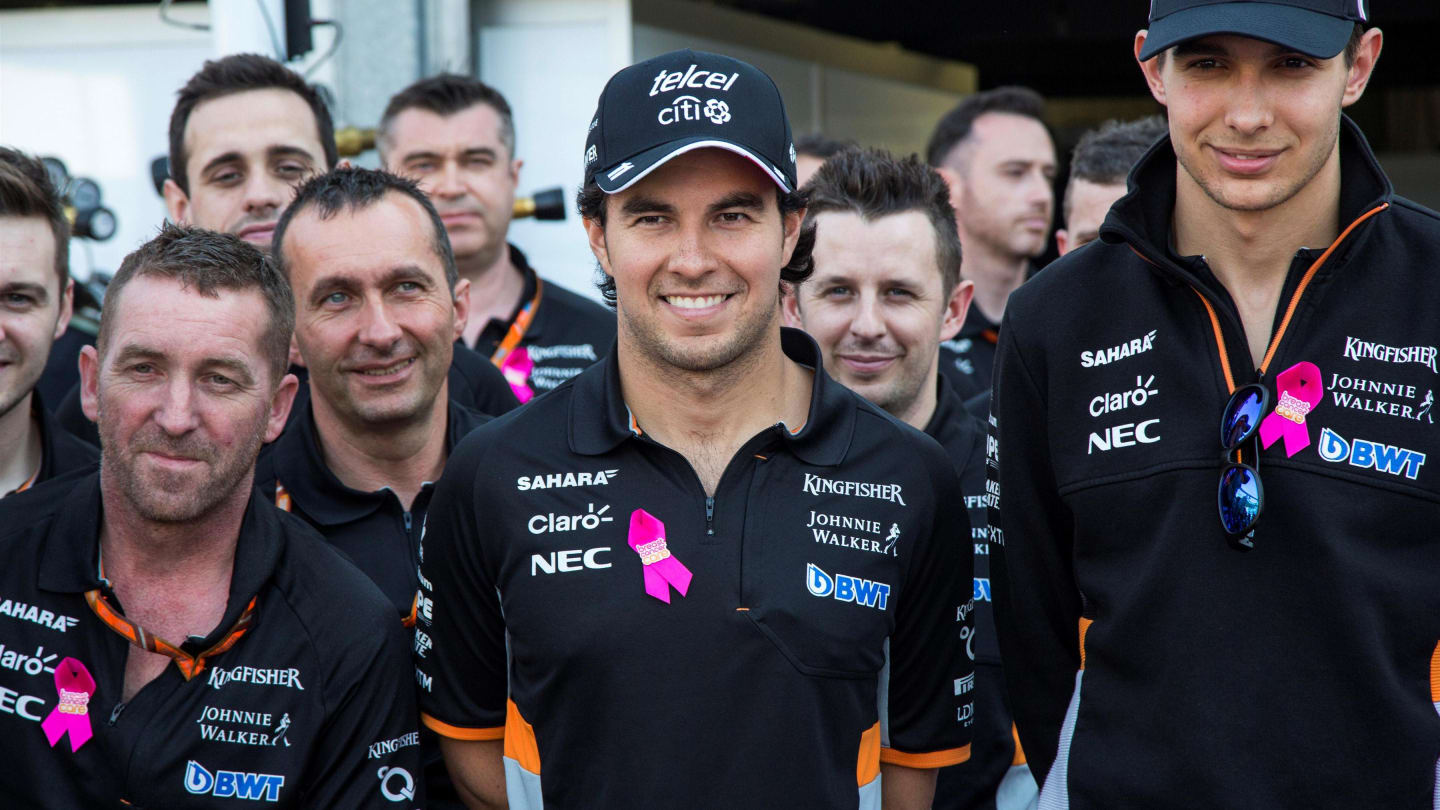 Sergio Perez (MEX) Force India, Esteban Ocon (FRA) Force India F1 and the team mechanics at the reveal of the the Breast Cancer Care partnership with Force India F1 at Formula One World Championship, Rd6, Monaco Grand Prix, Preparations, Monte-Carlo, Monaco, Wednesday 24 May 2017. © Sutton Images
