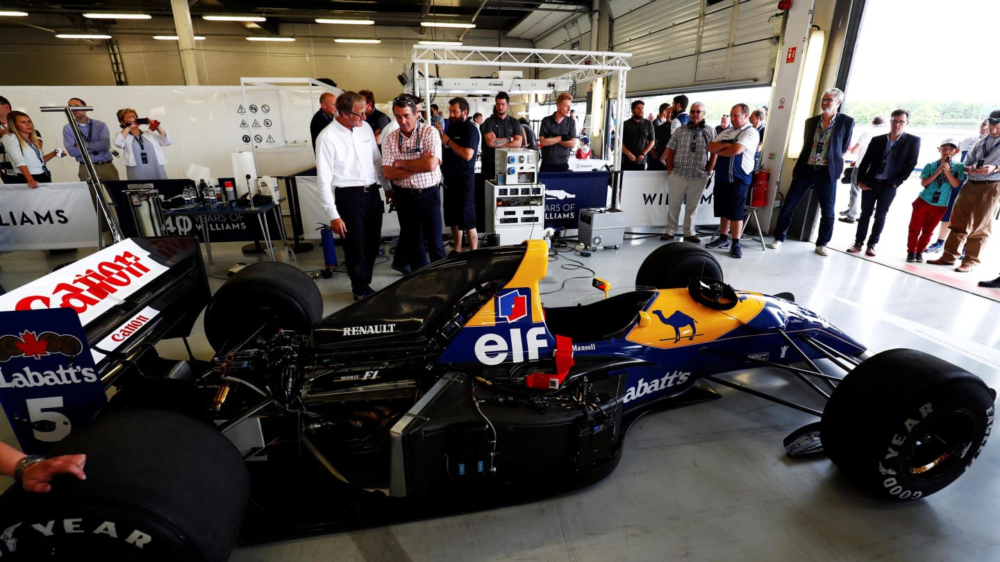 Dickie Stanford (GBR) and Nigel Mansell (GBR) observe the Williams-Renault FW14B chassis at Williams British Grand Prix Preview Day, Silverstone, England, 2 June 2017. © Sutton Images
