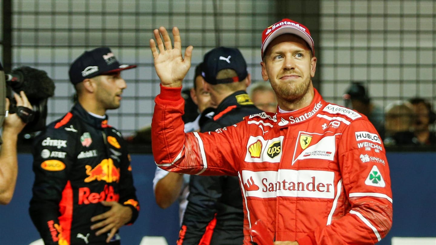 Pole sitter Sebastian Vettel (GER) Ferrari celebrates in parc ferme at Formula One World Championship, Rd14, Singapore Grand Prix, Qualifying, Marina Bay Street Circuit, Singapore, Saturday 16 September 2017. © Sutton Images