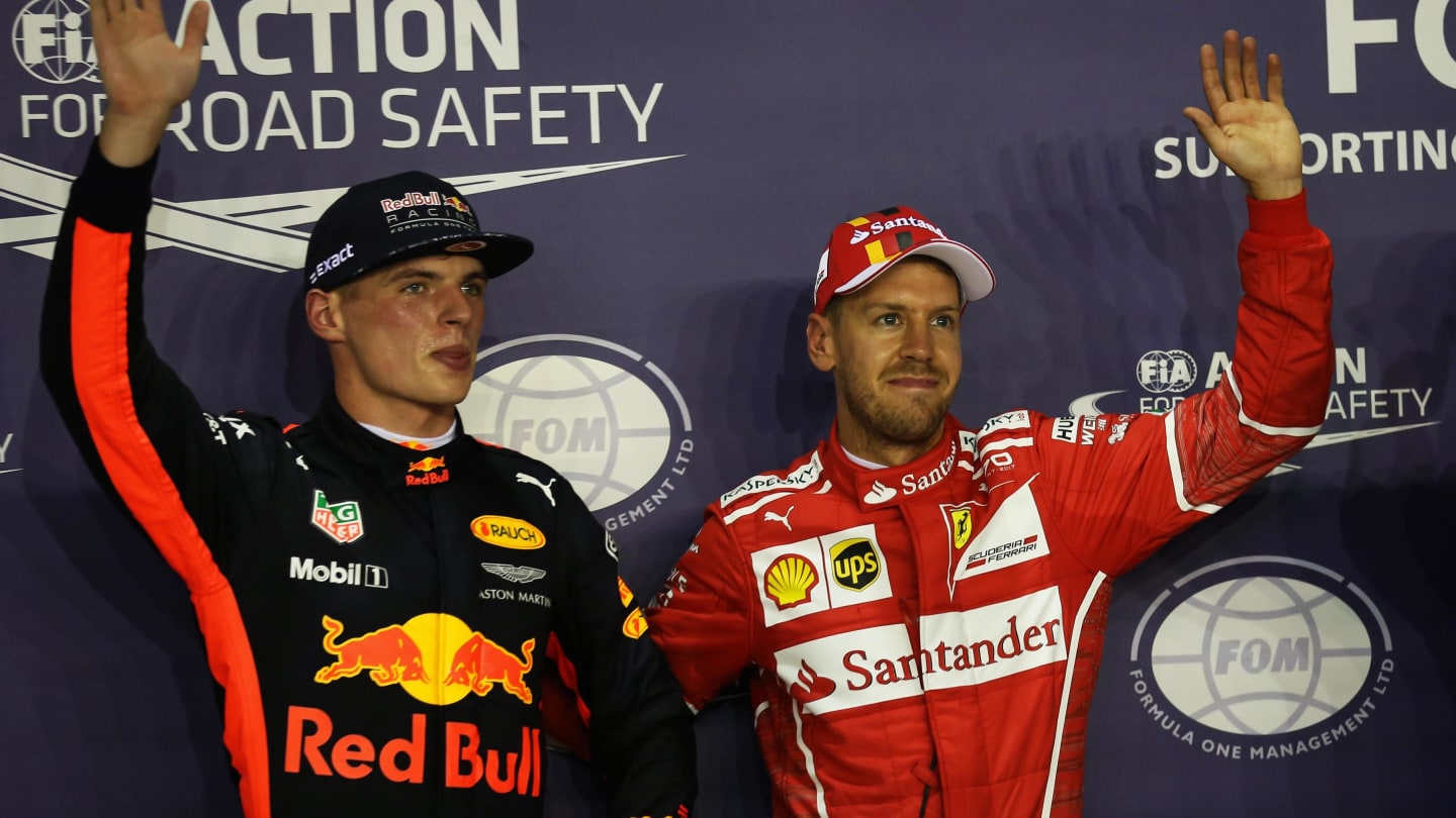 Max Verstappen (NED) Red Bull Racing and pole sitter Sebastian Vettel (GER) Ferrari celebrate in