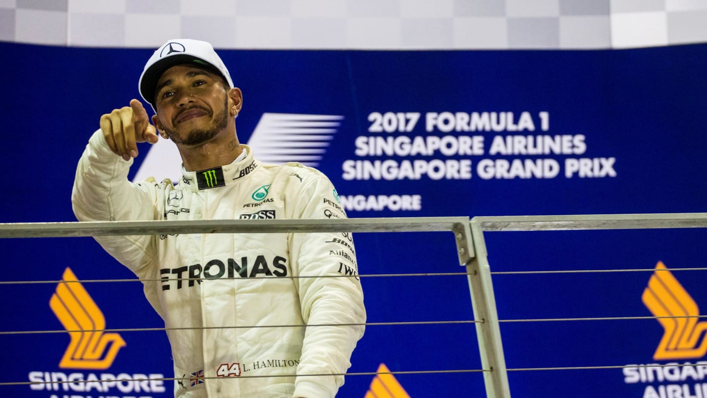 Race winner Lewis Hamilton (GBR) Mercedes AMG F1 Celebrates on the podium at Formula One World Championship, Rd14, Singapore Grand Prix, Race, Marina Bay Street Circuit, Singapore, Sunday 17 September 2017. © Manuel Goria/Sutton Images