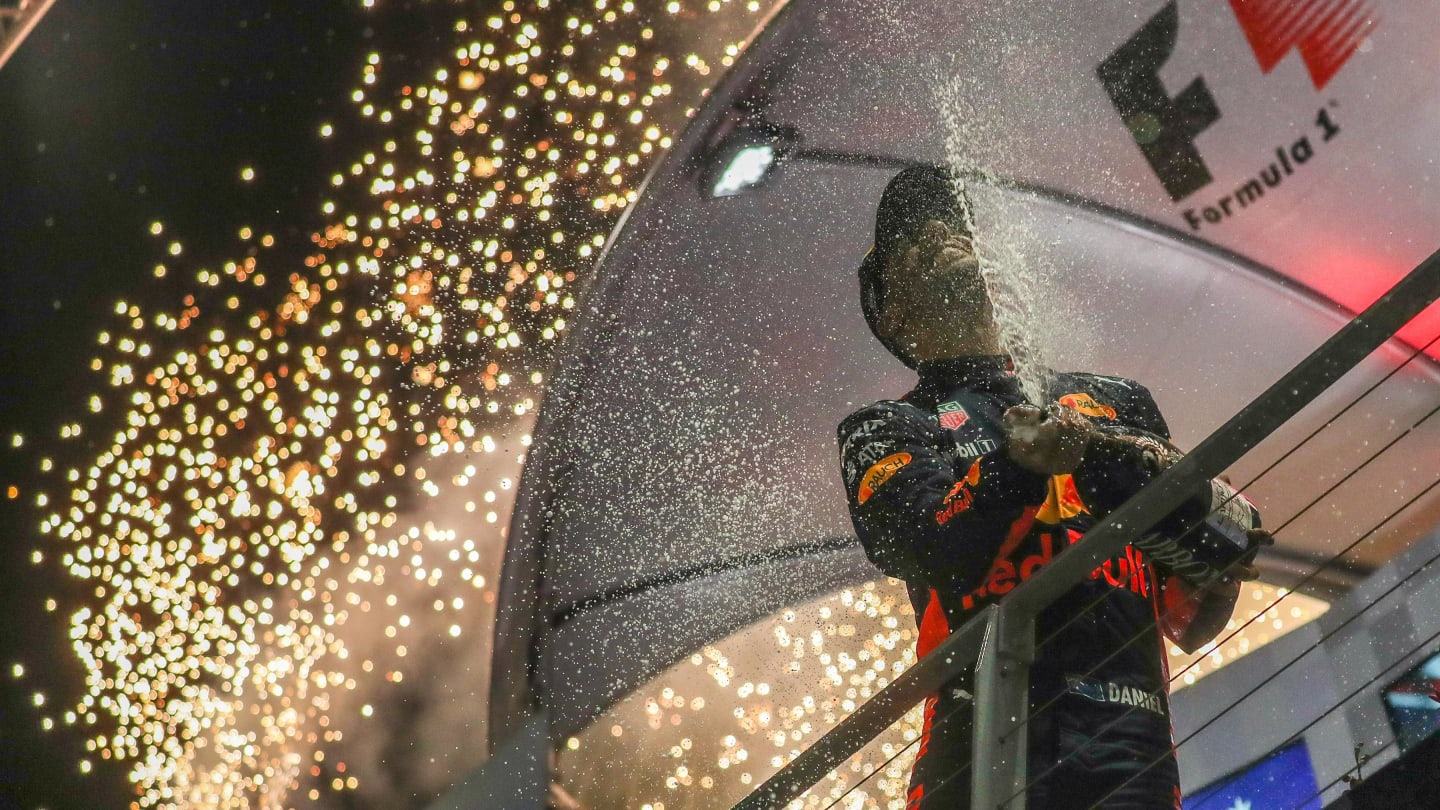 Daniel Ricciardo (AUS) Red Bull Racing Celebrates on the podium with the champagne at Formula One World Championship, Rd14, Singapore Grand Prix, Race, Marina Bay Street Circuit, Singapore, Sunday 17 September 2017. © Sutton Images