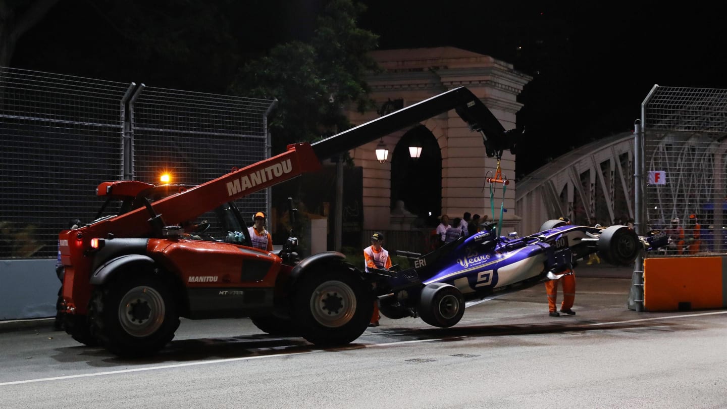 The crashed car of Marcus Ericsson (SWE) Sauber C36 is recovered at Formula One World Championship, Rd14, Singapore Grand Prix, Race, Marina Bay Street Circuit, Singapore, Sunday 17 September 2017. © Kym Illman/Sutton Images