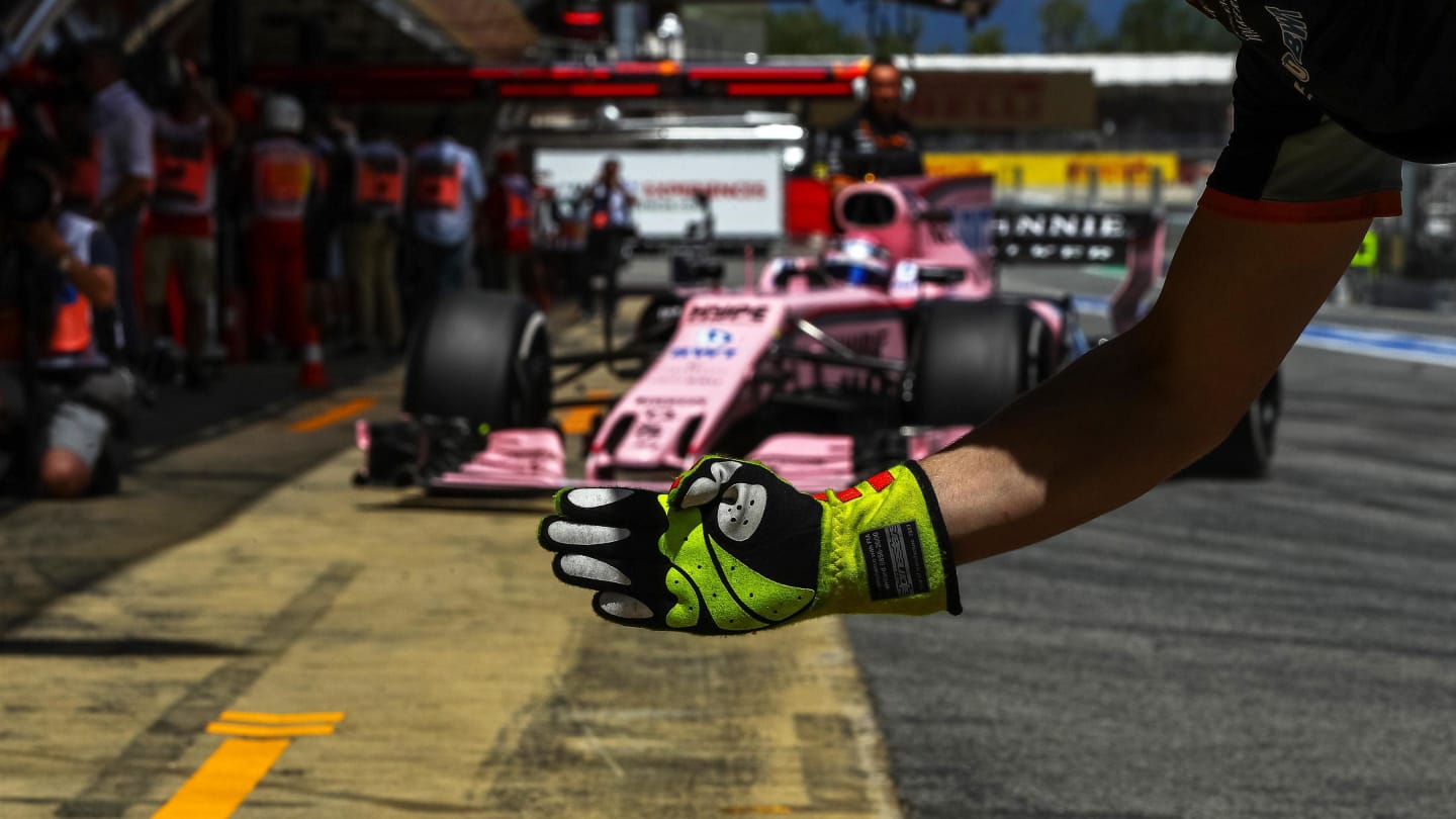 Sergio Perez (MEX) Force India VJM10 and Force India mechanics glove at Formula One World Championship, Rd5, Spanish Grand Prix, Practice, Barcelona, Spain, Friday 12 May 2017. © Sutton Motorsport Images