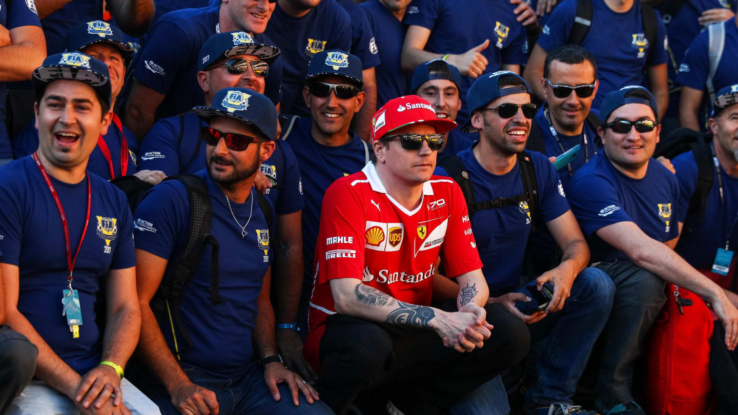 Kimi Raikkonen (FIN) Ferrari with FIA Volunteers at Formula One World Championship, Rd5, Spanish Grand Prix, Practice, Barcelona, Spain, Friday 12 May 2017. © Sutton Motorsport Images/Kym Illman