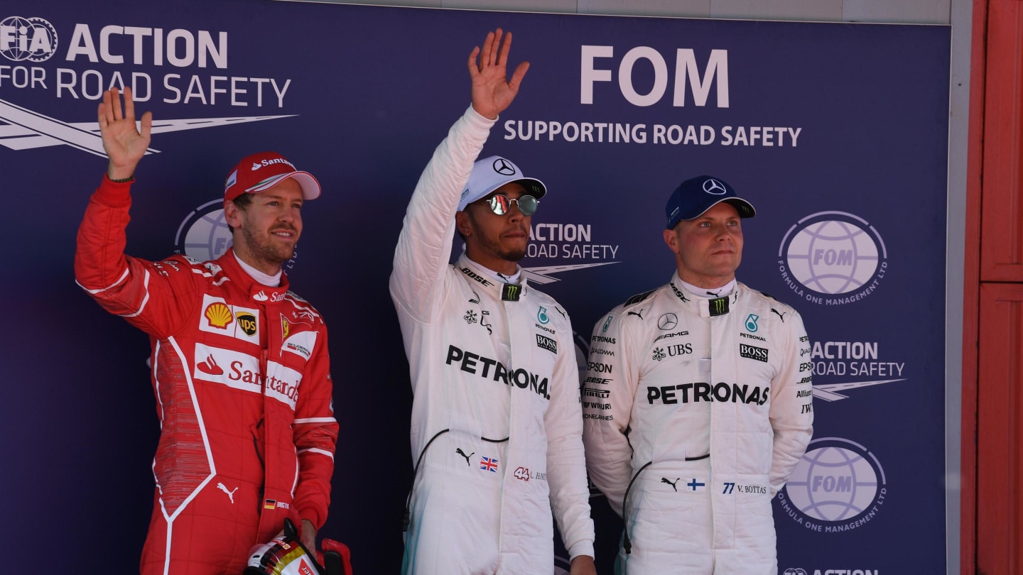 (L to R): Vettel (GER) Ferrari, Hamilton (GBR) Mercedes AMG F1 and Bottas (FIN) Mercedes AMG F1 celebrate in parc ferme at F1 World Championship, Rd5, Spanish Grand Prix, Qualifying, Barcelona, Spain, Saturday 13 May 2017. © Sutton Motorsport Images
