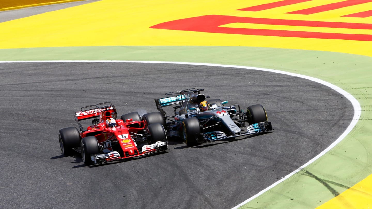 Sebastian Vettel (GER) Ferrari SF70-H and Lewis Hamilton (GBR) Mercedes-Benz F1 W08 Hybrid battle for the lead at Formula One World Championship, Rd5, Spanish Grand Prix, Race, Barcelona, Spain, Sunday 14 May 2017. © Sutton Motorsport Images