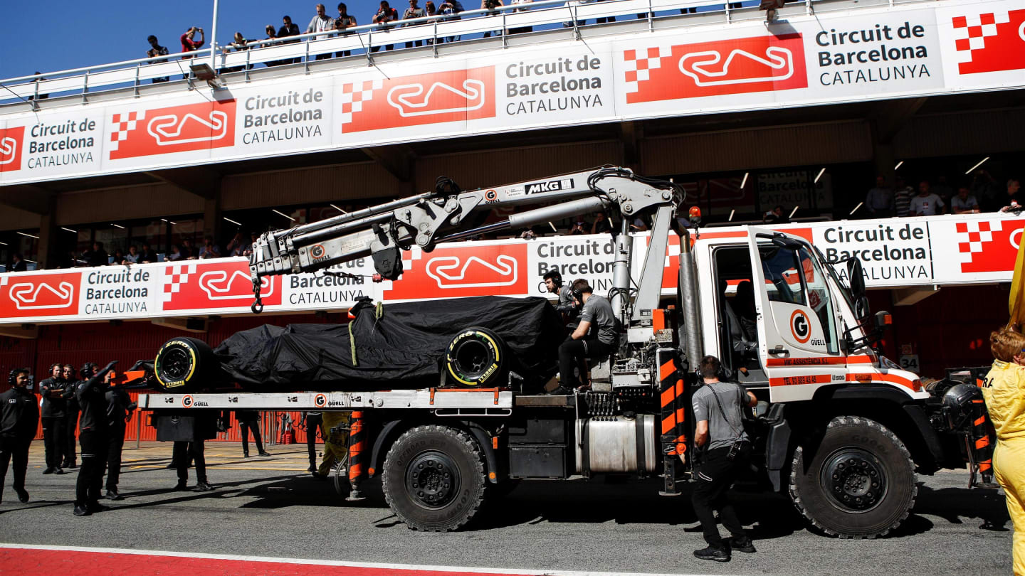 The car of Fernando Alonso (ESP) McLaren MCL32 is returned to the pits at Formula One Testing, Day Four, Barcelona, Spain, 10 March 2017. © Sutton Images