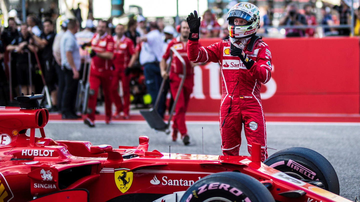 Sebastian Vettel (GER) Ferrari celebrates in parc ferme at Formula One World Championship, Rd17,