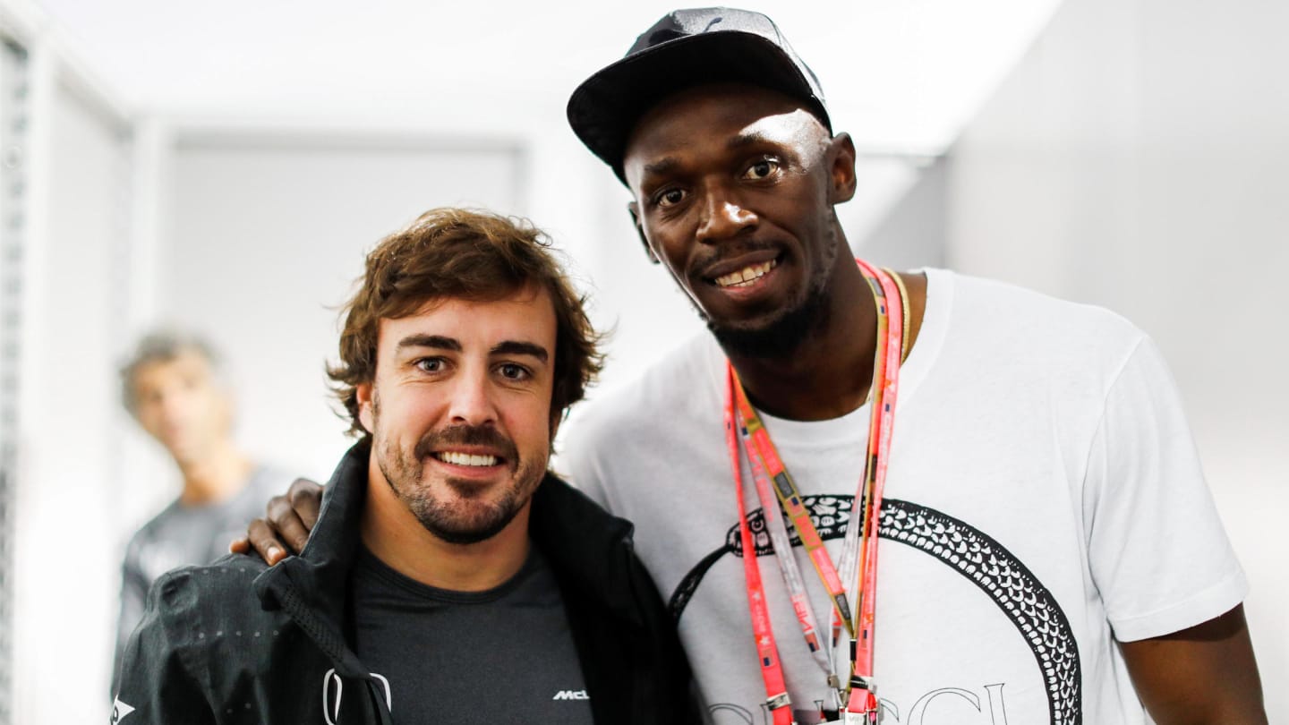 Fernando Alonso (ESP) McLaren and Usain Bolt (USA) at Formula One World Championship, Rd17, United States Grand Prix, Race, Circuit of the Americas, Austin, Texas, USA, Sunday 22 October 2017. © Steven Tee/LAT/Sutton Images