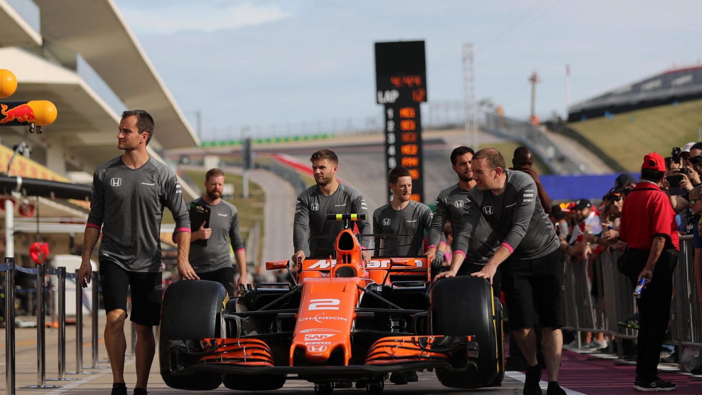 McLaren mechanics with McLaren MCL32 in pit lane at Formula One World Championship, Rd17, United States Grand Prix, Preparations, Circuit of the Americas, Austin, Texas, USA, Thursday 19 October 2017. © Kym Illman/Sutton Images