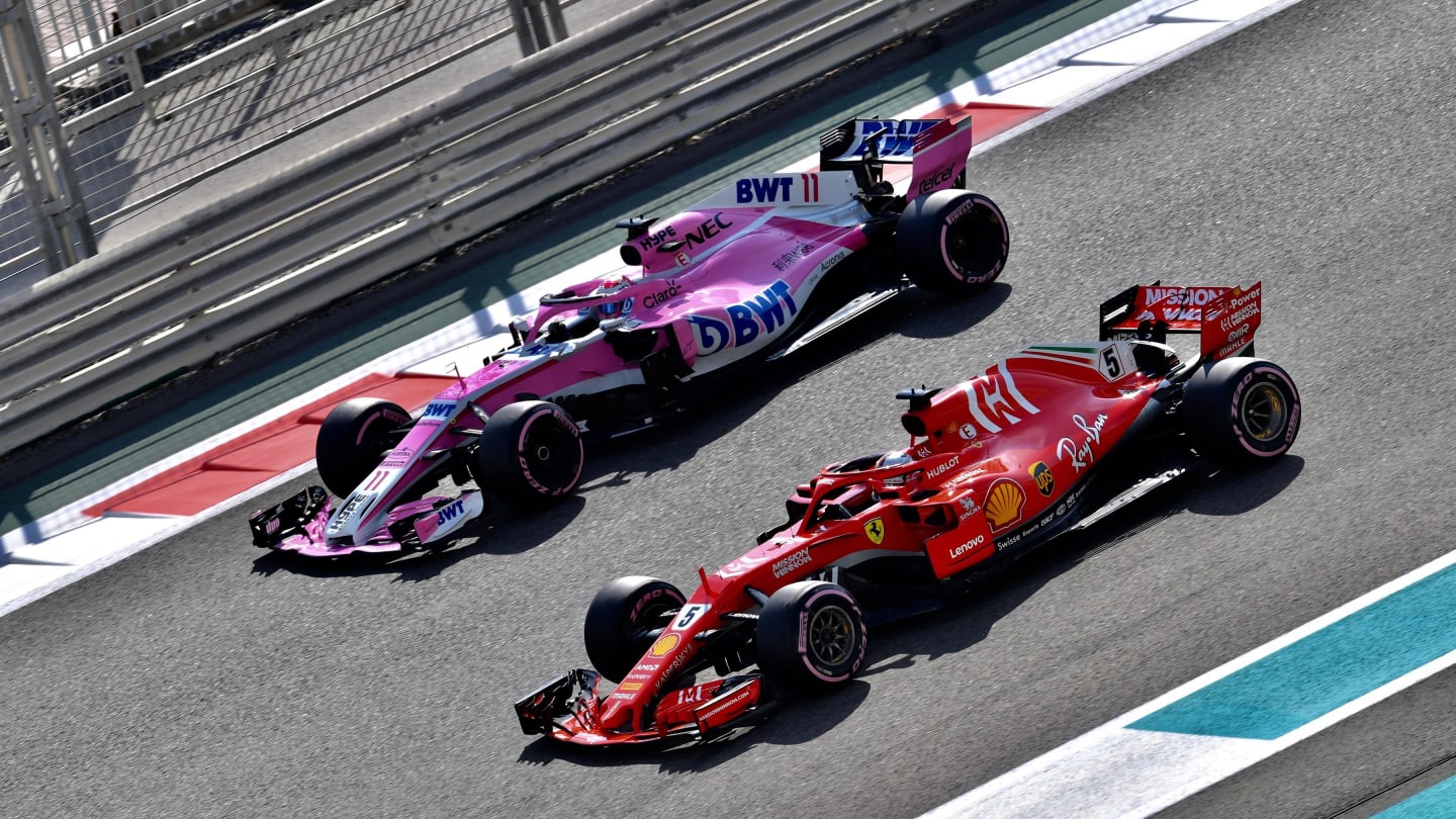 Sebastian Vettel, Ferrari SF71H and Sergio Perez, Racing Point Force India VJM11 at Formula One