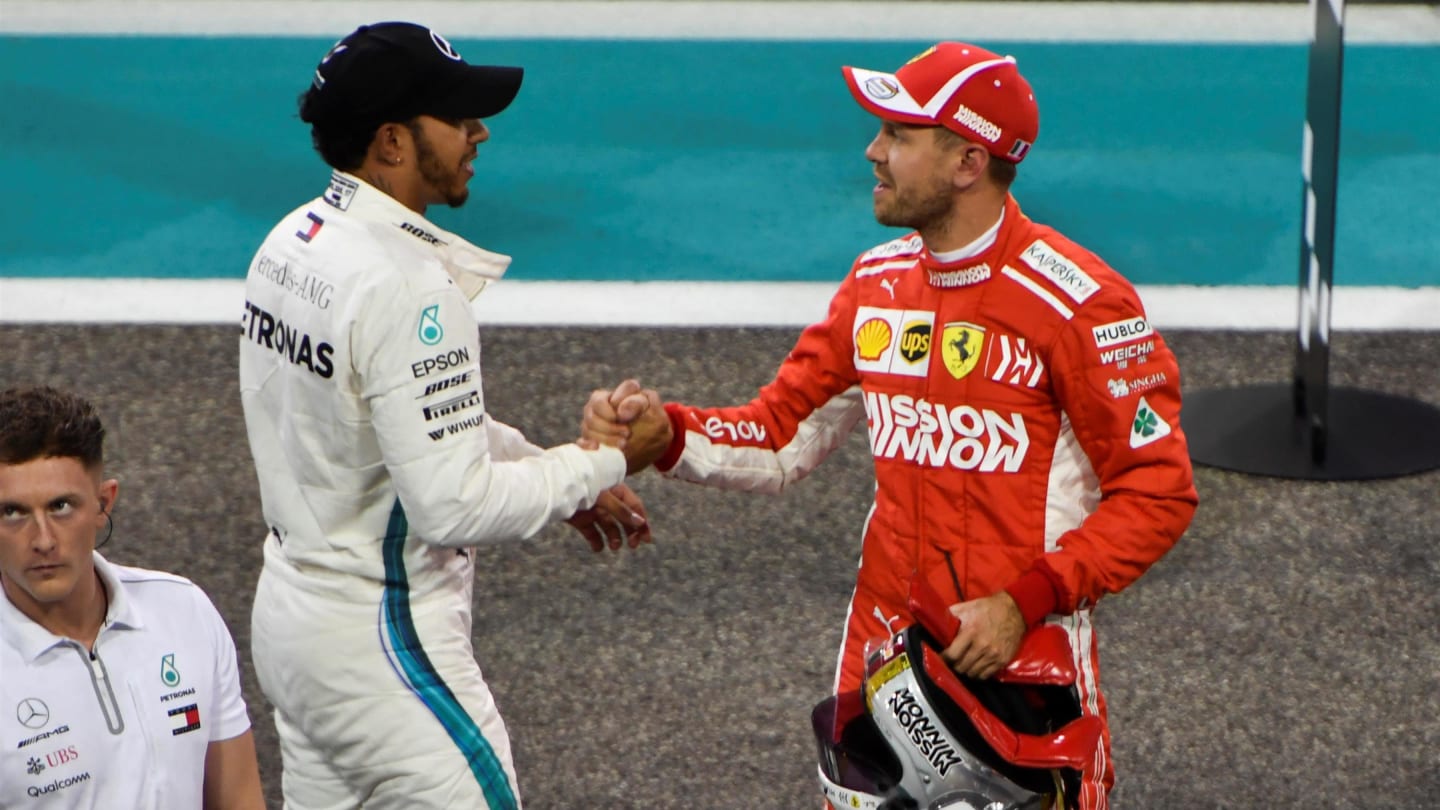 Lewis Hamilton, Mercedes AMG F1 and Sebastian Vettel, Ferrari celebrate in Parc Ferme at Formula