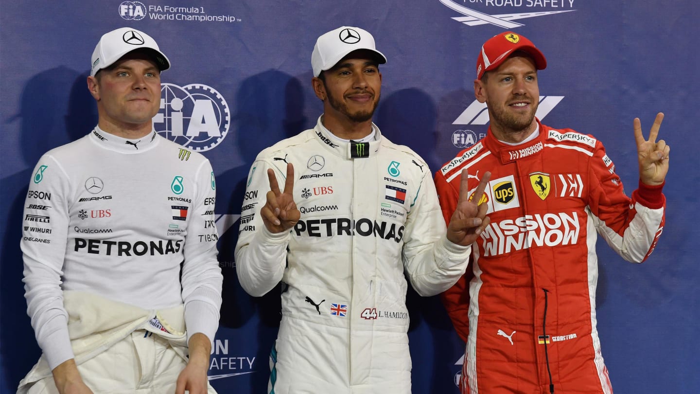 (L to R): Valtteri Bottas, Mercedes AMG F1, Lewis Hamilton, Mercedes AMG F1 and Sebastian Vettel,
