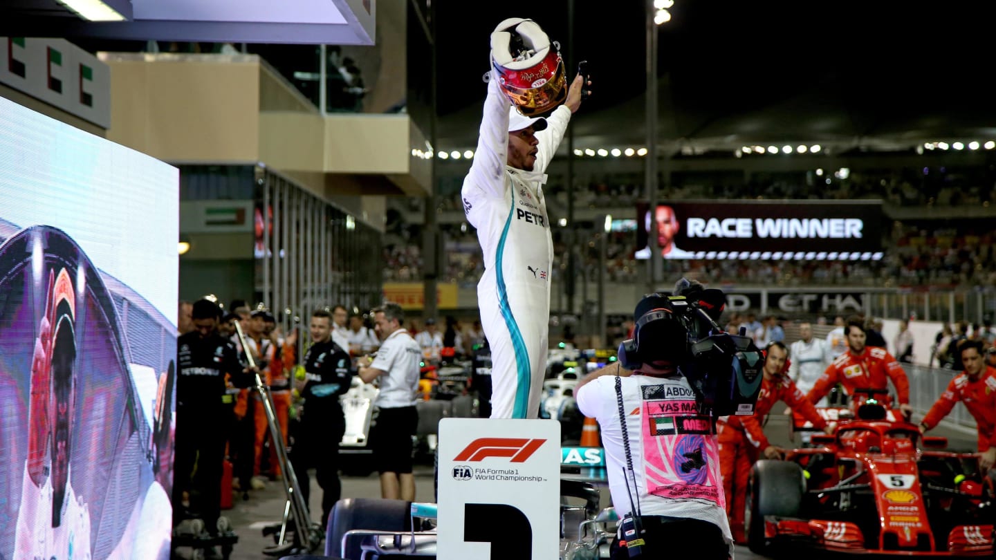 Lewis Hamilton, Mercedes AMG F1 celebrates in Parc Ferme at Formula One World Championship, Rd21,