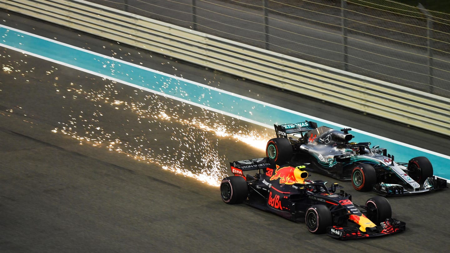 Max Verstappen, Red Bull Racing RB14 and Lewis Hamilton, Mercedes-AMG F1 W09 EQ Power+ sparks and