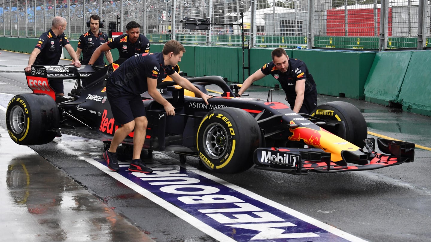 Red Bull Racing mechanics push Red Bull Racing RB14 in pit lane at Formula One World Championship, Rd1, Australian Grand Prix, Qualifying, Melbourne, Australia, Saturday 24 March 2018. © Mark Sutton/Sutton Images