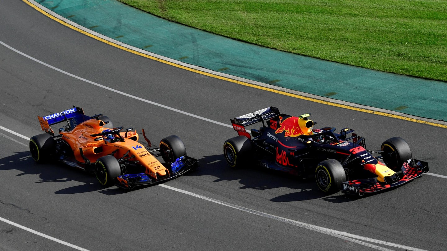Max Verstappen (NED) Red Bull Racing RB14 and Fernando Alonso (ESP) McLaren MCL33 at Formula One