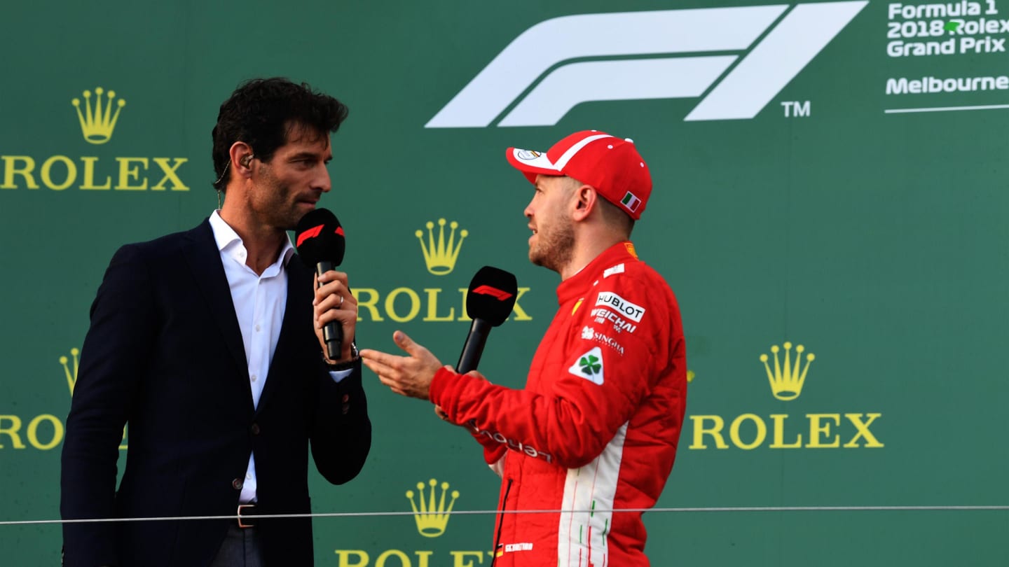 Race winner Sebastian Vettel (GER) Ferrari talks with Mark Webber (AUS) on the podium at Formula One World Championship, Rd1, Australian Grand Prix, Race, Melbourne, Australia, Sunday 25 March 2018. © Mark Sutton/Sutton Images