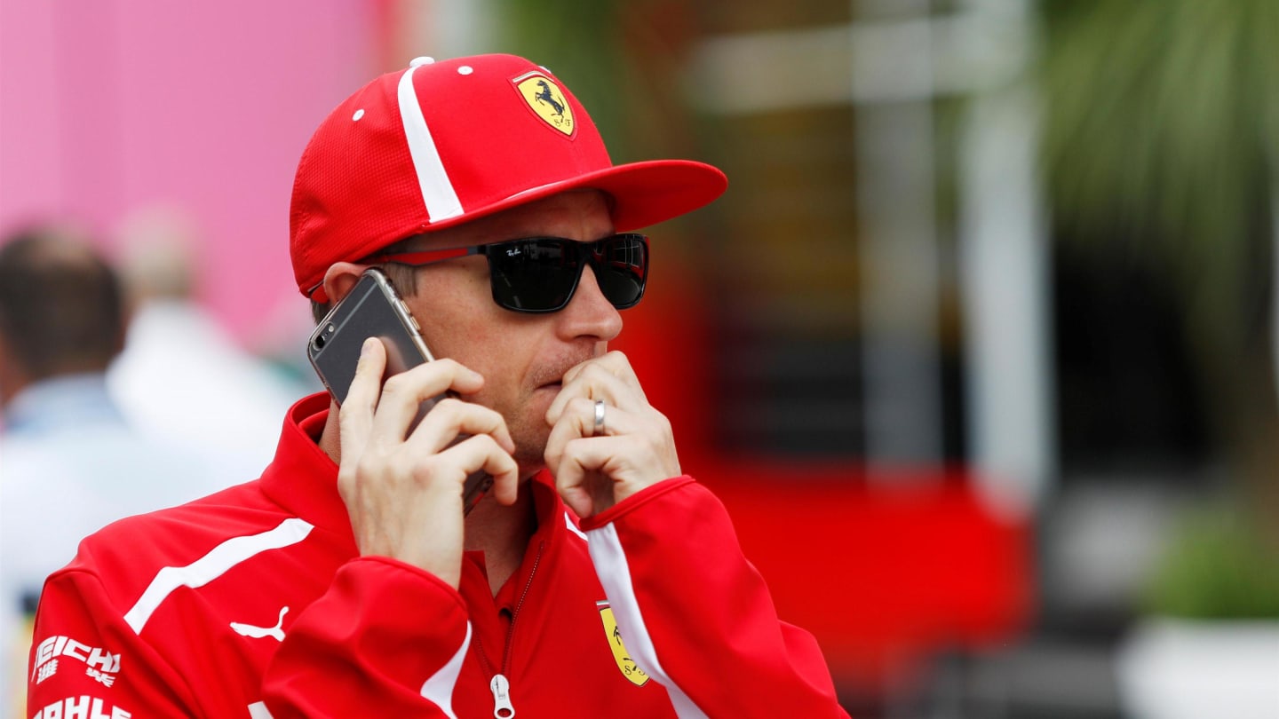 Kimi Raikkonen (FIN) Ferrari on the phone at Formula One World Championship, Rd9, Austrian Grand