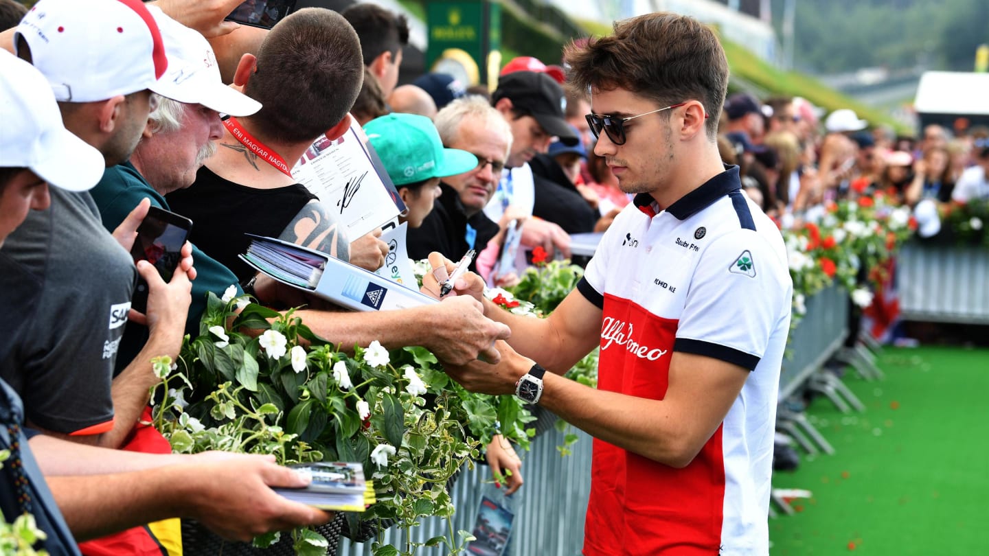 Charles Leclerc (MON) Alfa Romeo Sauber F1 Team signs autographs for the fans at Formula One World Championship, Rd9, Austrian Grand Prix, Qualifying, Spielberg, Austria, Saturday 30 June 2018. © Mark Sutton/Sutton Images
