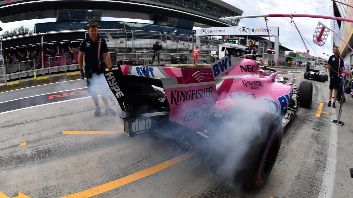 Sergio Perez (MEX) Force India VJM11 and tyre smoke at Formula One World Championship, Rd9,