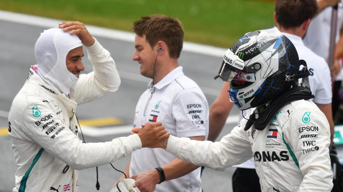 Lewis Hamilton (GBR) Mercedes-AMG F1 celebrates with pole sitter Valtteri Bottas (FIN) Mercedes-AMG