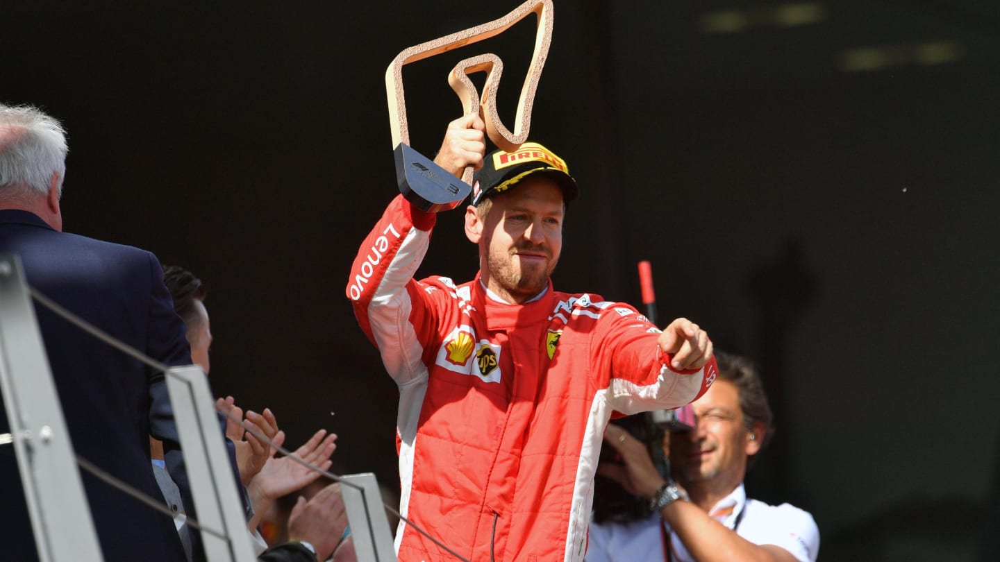 Sebastian Vettel (GER) Ferrari celebrates on the podium with the trophy at Formula One World Championship, Rd9, Austrian Grand Prix, Race, Spielberg, Austria, Sunday 1 July 2018. © Jerry Andre/Sutton Images