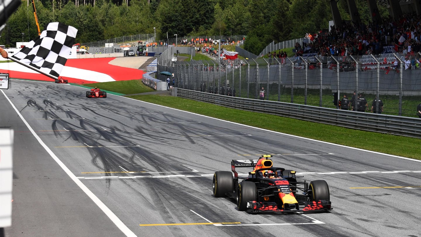 Race winner Max Verstappen (NED) Red Bull Racing RB14 takes the chequered flag at Formula One World Championship, Rd9, Austrian Grand Prix, Race, Spielberg, Austria, Sunday 1 July 2018. © Mark Sutton/Sutton Images