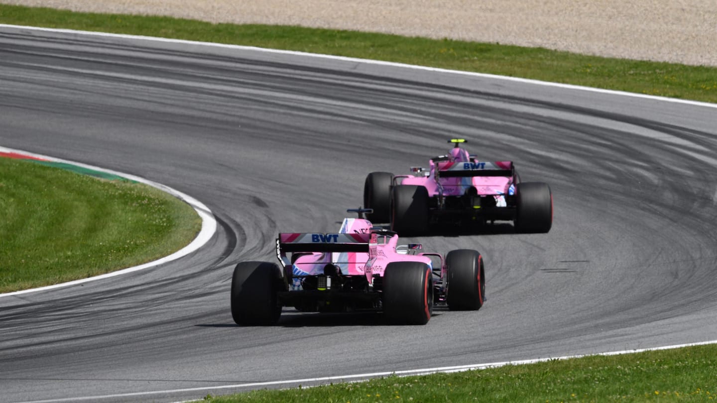 Esteban Ocon (FRA) Force India VJM11 and Sergio Perez (MEX) Force India VJM11 at Formula One World