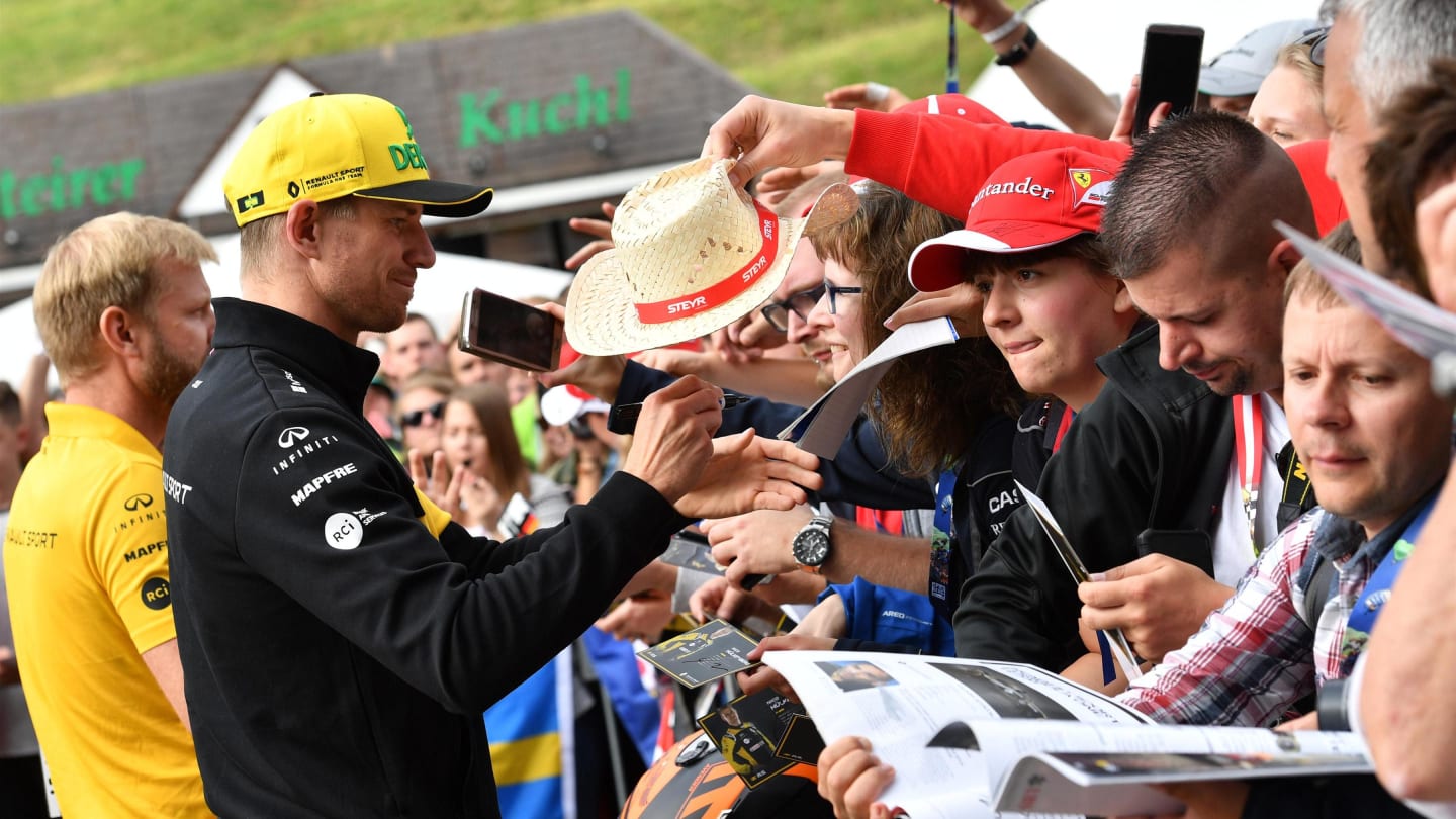 Nico Hulkenberg (GER) Renault Sport F1 Team signs autographs for the fans at Formula One World Championship, Rd9, Austrian Grand Prix, Preparations, Spielberg, Austria, Thursday 28 June 2018. © Jerry Andre/Sutton Images