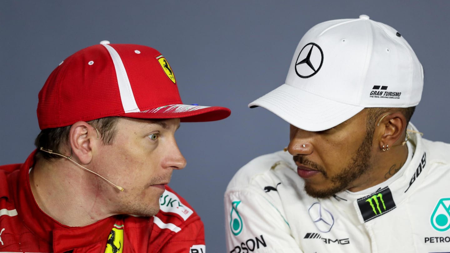 Kimi Raikkonen (FIN) Ferrari and Lewis Hamilton (GBR) Mercedes-AMG F1 in the Press Conference at